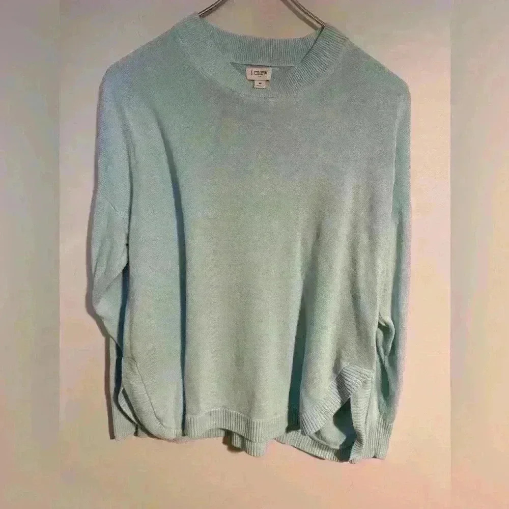 Women’s j crew sweater size M pastel blue with slit detail on the side EUC